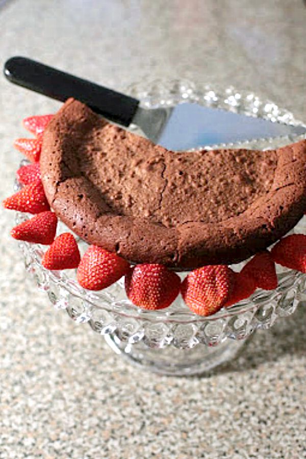 Decadent chocolate cake will make any chocolate lover weak in the knees. This cake is so moist, each bite will literally melt in your mouth as you eat it! | Basilmomma.com