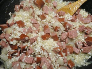 Sausage risotto recipe, cooking in a pan