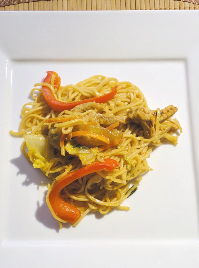 Pork Yakisoba - Japanese ramen noodles, lean pork, cabbage, carrots, onions, all tossed in a slightly sweet sauce. Recipe on basilmomma.com