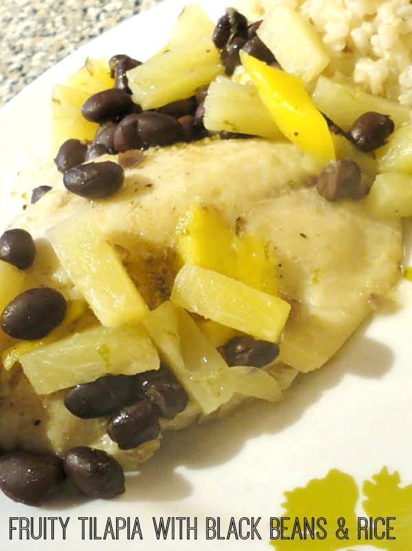 Making heart healthy seafood recipes is easier than you think! We made this fruity tilapia with black beans and brown rice. Get the recipe on Basilmomma.com