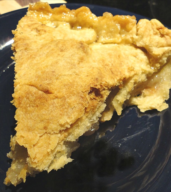 Country Apple Pie Recipe - Tender, spiced apples and a flaky, buttery crust. Get the classic dessert recipe on basilmomma.com