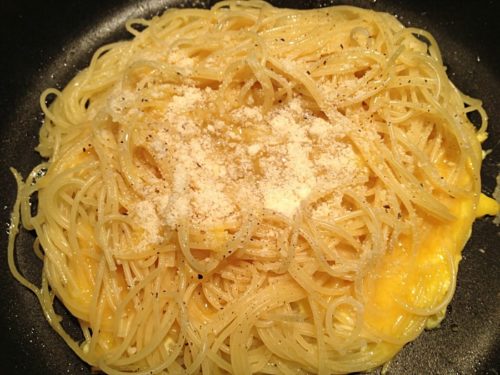Breakfast Noodle Nests - A kid-friendly breakfast made with cold pasta noodles, eggs, and Parmesan cheese. SO easy to make and my kids love them!