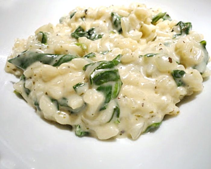 Spinach Goat Cheese Risotto is a creamy, comforting, delicious side dish! Get the recipe from basilmomma.com