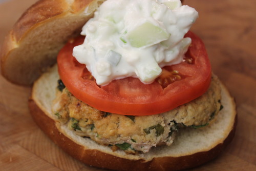 Turkey Burger Recipe, with spinach, Feta cheese, hummus, and a creamy cucumber topping. Get this healthy dinner recipe at basilmomma.com