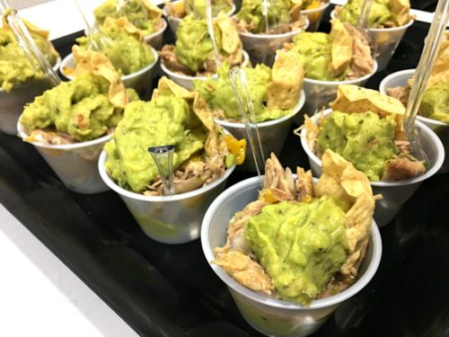 Mango duck mini tostadas are a quick, easy, and flavorful appetizer for any occasion. Fresh mango, shredded duck breast, red onion and spices sit in bite sized corn tortilla cups with fresh guacamole. | Basilmomma.com