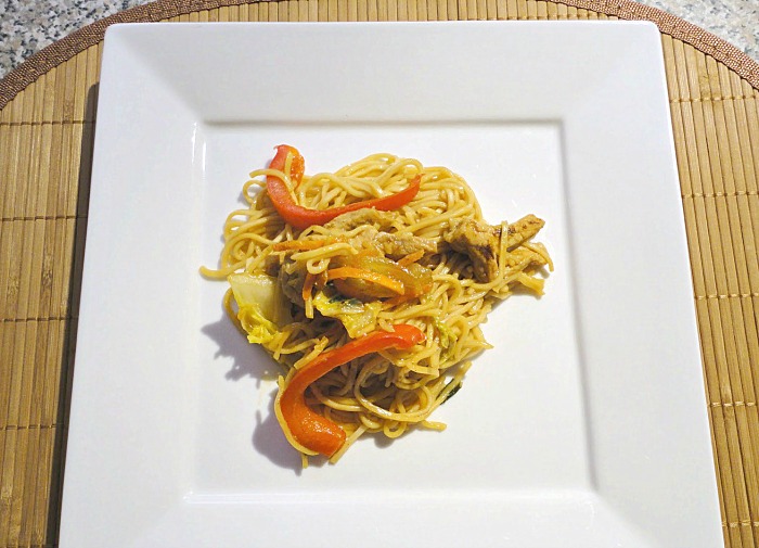 Pork Yakisoba - Japanese ramen noodles, lean pork, cabbage, carrots, onions, all tossed in a slightly sweet sauce. Recipe on basilmomma.com