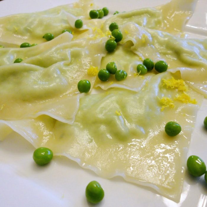 Sweet pea ricotta ravioli with pureed sweet peas, ricotta, and lemon, folded up inside of won ton wrappers, then cooked to tender perfection. | Basilmomma.com