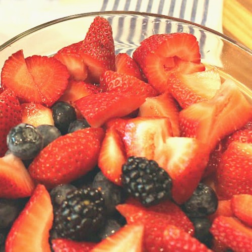 Fresh blueberries, strawberries, and blackberries, used for making a triple berry tea puree