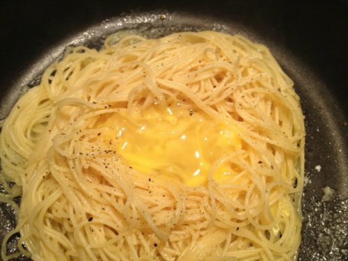 eggs and cold spaghetti noodles, used for making breakfast noodle nests.