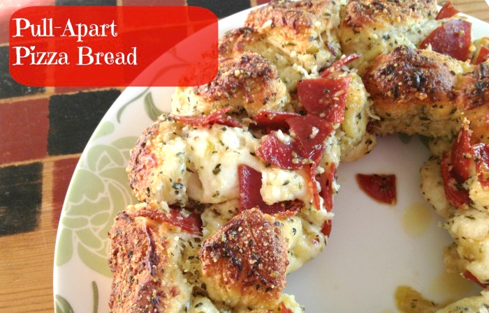 Pull apart pizza bread is a quick and easy pull apart bread recipe from the Gooseberry Patch cookbook, Garfield...Recipes with Catitude. Get the recipe on basilmomma.com