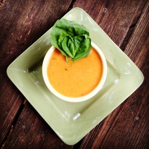 An easy tomato basil soup recipe using fresh garden ingredients, a soup pot and an immersion blender! In my opinion, the best homemade tomato soup recipe