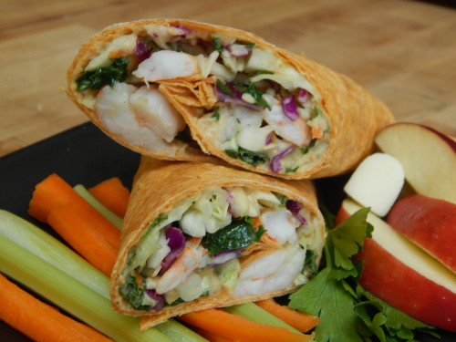 This heart healthy hand held seafood recipe for Citrus Shrimp with Spicy Hummus Wrap can be found on basilmomma.com