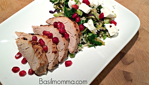 Marinated pork tenderloin recipe, prepared with a pomegranate vinaigrette marinade, served with pomegranate arils, goat cheese, and tender brown rice. Get the recipe on basilmomma.com