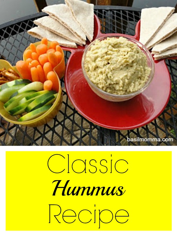 Classic hummus recipe from basilmomma.com - When you're having a snack attack, this classic hummus recipe is a healthy treat. Made with chickpeas, tahini, and fresh herbs, it'll curb your cravings!