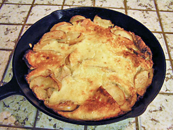 Baked Apple Skillet Pancake Recipe - Perfect for breakfast, brunch, or a light supper. Get the recipe on basilmomma.com