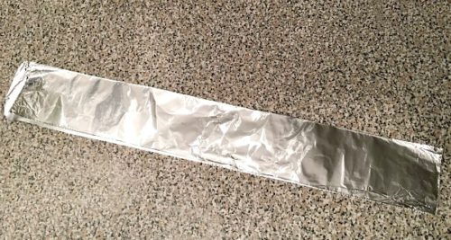 strip of aluminum foil, used to create a harness to hold meatloaf as it cooks in an Instant Pot.